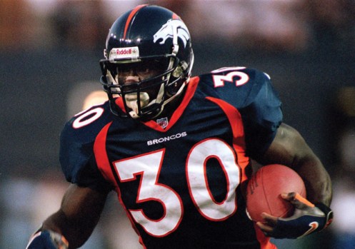 Caption: Terrell Davis scores the Broncos first touchdown of the game, during the Denver - New England football game in Mile High Stadium, Monday, 9/7/98. Photographer: Andy Cross Title: Staff Credit: The Denver Post City: Denver State: CO Date: 19980907 CaptionWriter: JC Keyword: PUBDATE____1998_10_07